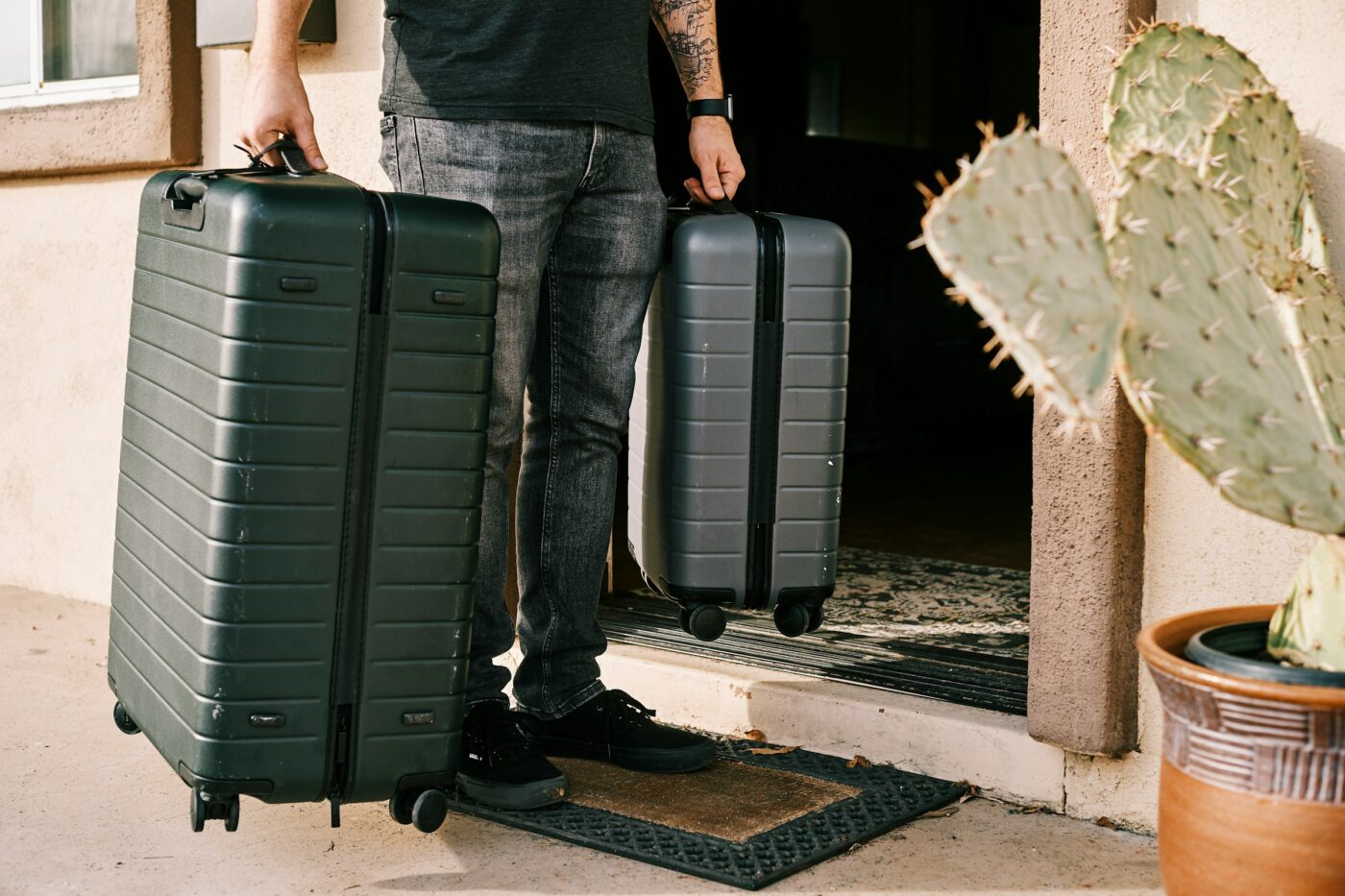 Traveler standing with a suitcase, representing parenting plan international travel restrictions in Washington custody cases.