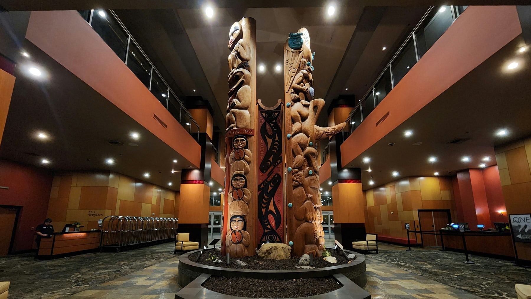 Welcome and story poles inside a Tulalip building for an article about Tulalip Tribal Court divorce jurisdiction.