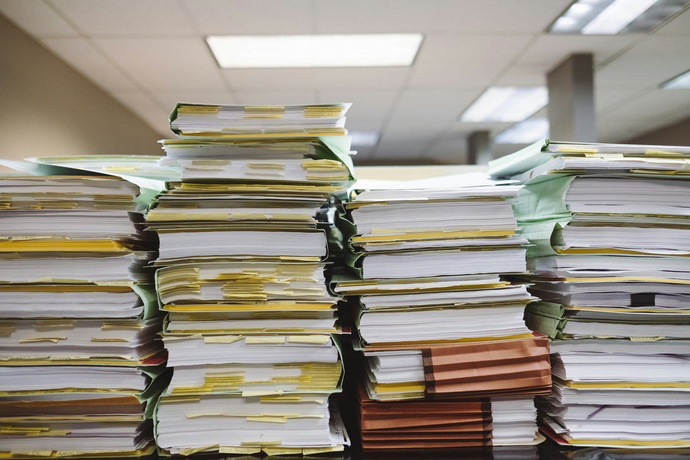 Stacks of file folders and documents, the paperwork to file for divorce in Everett, Washington